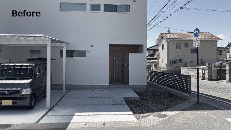 シンプルなファサードと温かみのあるガーデン。